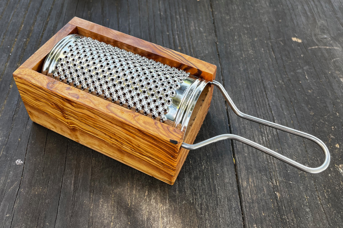 Parmesan / cheese grater made of olive wood
